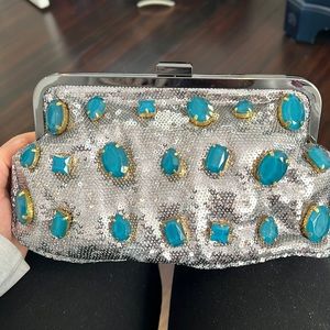 Sequin clutch with blue stones brand new